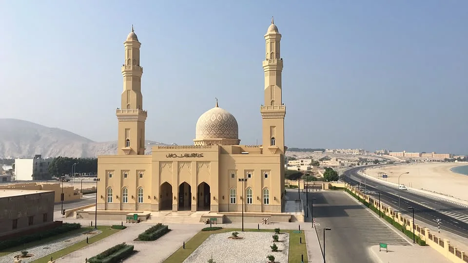 Sultan Qaboos Mosque in Bukha, with its twin minarets and dome, Musandam